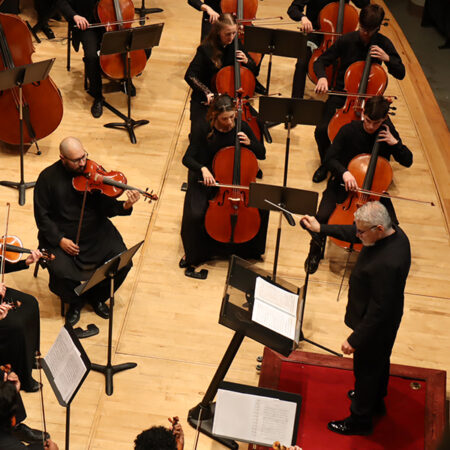 Ransom Wilson conducting the Huxford Symphony Orchestra