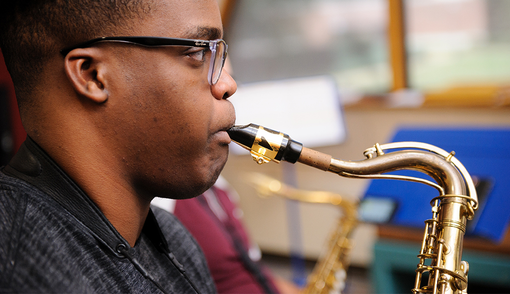 UA student playing a saxophone