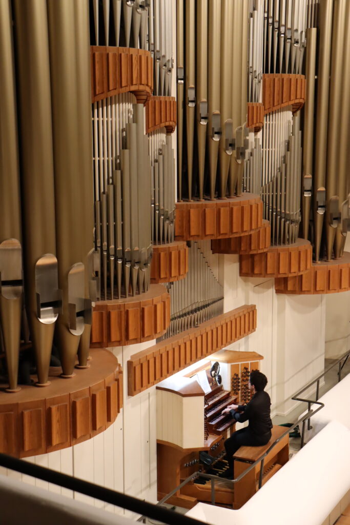Dr. Michael Delfin playing the big organ in Moody Concert Hall.