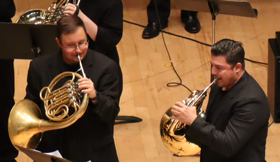 Matt Meadows and Josh Pantoja playing French Horn